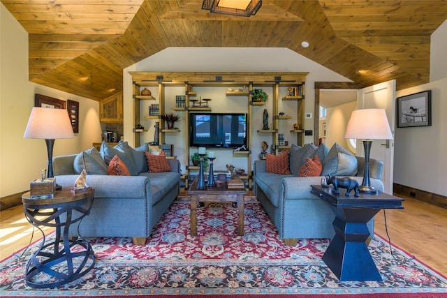 33702 N Finley Point Rd, Polson, MT 59860 - living area with lofted ceiling, wood ceiling, wood finished floors, and baseboards