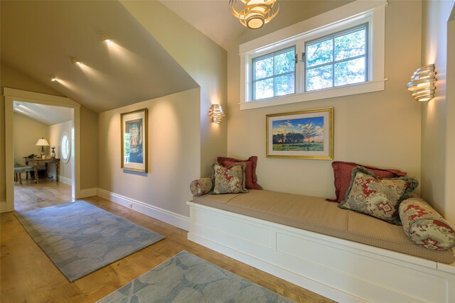 33702 N Finley Point Rd, Polson, MT 59860 - interior space featuring lofted ceiling, wood finished floors, and baseboards