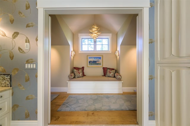 33702 N Finley Point Rd, Polson, MT 59860 - stairs featuring wood finished floors, baseboards, and vaulted ceiling
