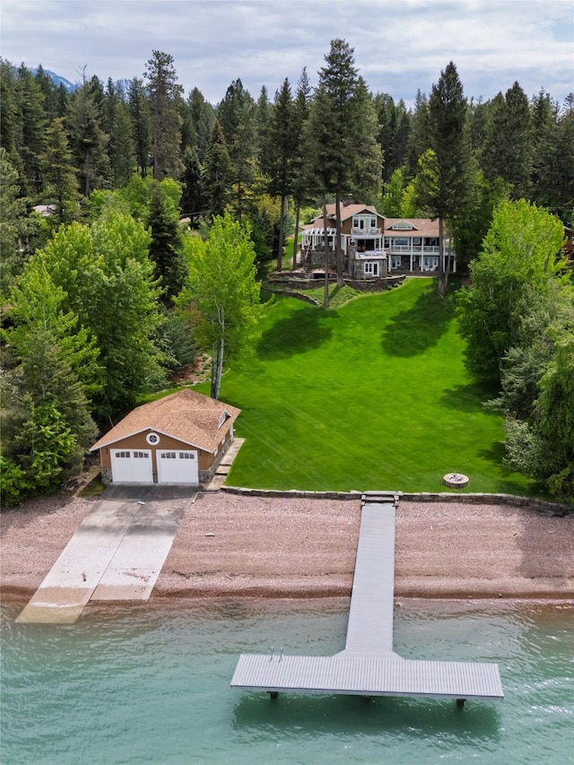 33702 N Finley Point Rd, Polson, MT 59860 - aerial view of property and surrounding area featuring a heavily wooded area and a large body of water