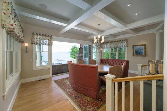 33702 N Finley Point Rd, Polson, MT 59860 - dining area featuring coffered ceiling, baseboards, light wood-style floors, beamed ceiling, and recessed lighting