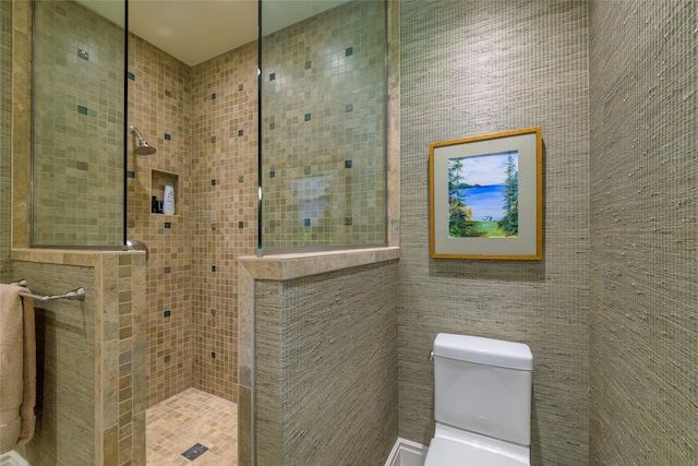 33702 N Finley Point Rd, Polson, MT 59860 - bathroom with a stall shower, toilet, and tile walls