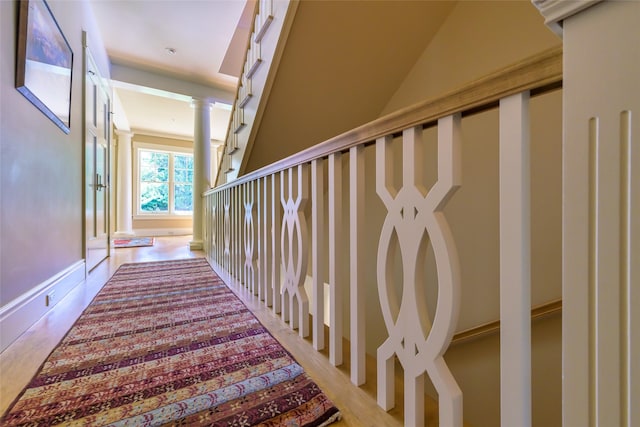 33702 N Finley Point Rd, Polson, MT 59860 - stairs with wood finished floors and ornate columns
