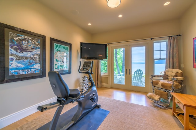 33702 N Finley Point Rd, Polson, MT 59860 - exercise area with french doors, recessed lighting, wood finished floors, and baseboards