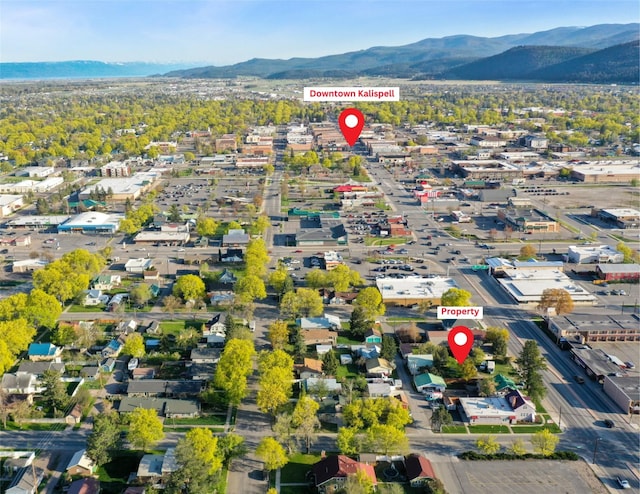 375 N Main St, Kalispell, MT 59901 - aerial view of property and surrounding area with a mountainous background