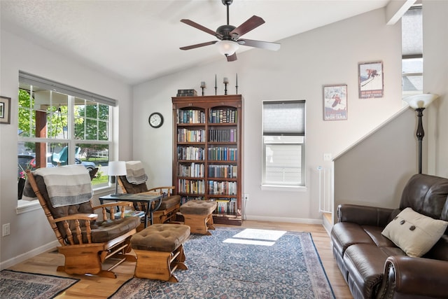 409 Bentley Park Loop, Missoula, MT 59801 - living area with wood finished floors, vaulted ceiling, and ceiling fan