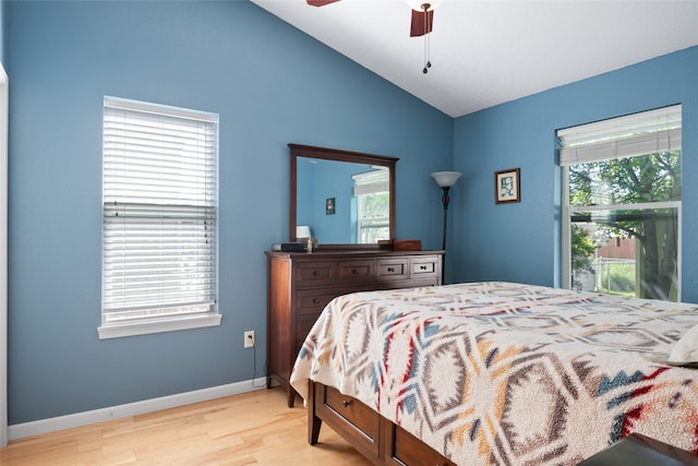 409 Bentley Park Loop, Missoula, MT 59801 - bedroom with light wood finished floors, lofted ceiling, and a ceiling fan