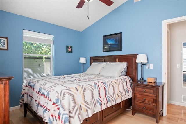409 Bentley Park Loop, Missoula, MT 59801 - bedroom with lofted ceiling, wood finished floors, and ceiling fan