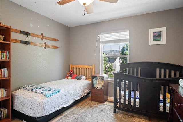 409 Bentley Park Loop, Missoula, MT 59801 - bedroom with wood finished floors and a ceiling fan