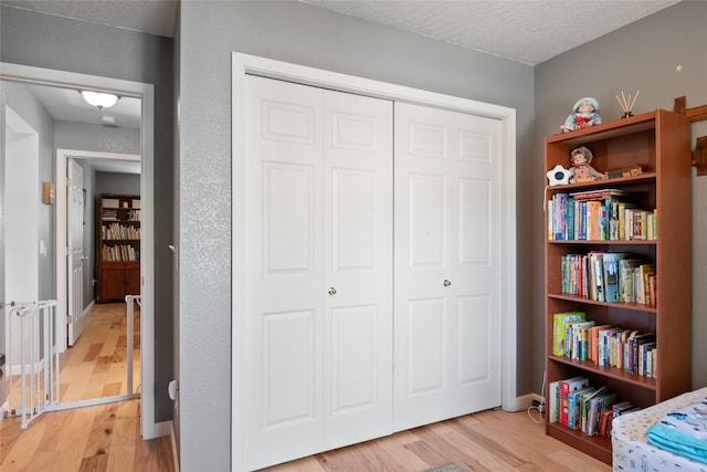 409 Bentley Park Loop, Missoula, MT 59801 - bedroom with light wood finished floors and a closet