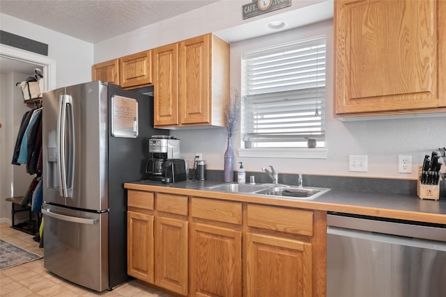409 Bentley Park Loop, Missoula, MT 59801 - kitchen featuring stainless steel appliances and dark countertops