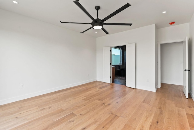 165 River Ranch Rd, Whitefish, MT 59937 - unfurnished bedroom featuring light wood-style floors, recessed lighting, baseboards, ensuite bath, and ceiling fan