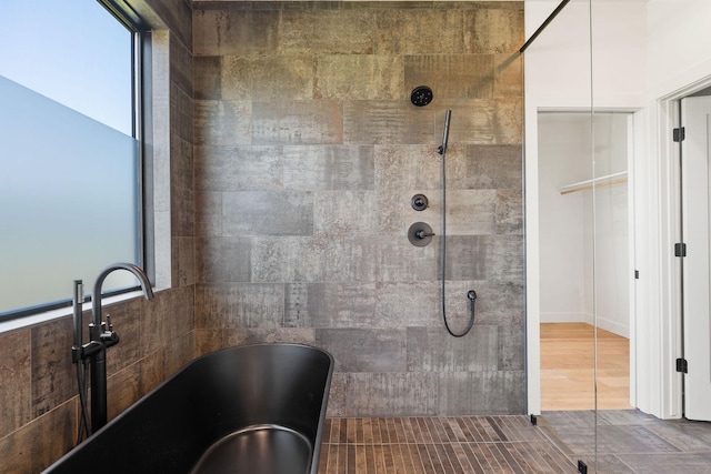 165 River Ranch Rd, Whitefish, MT 59937 - full bathroom with a sink, a freestanding bath, and tiled shower