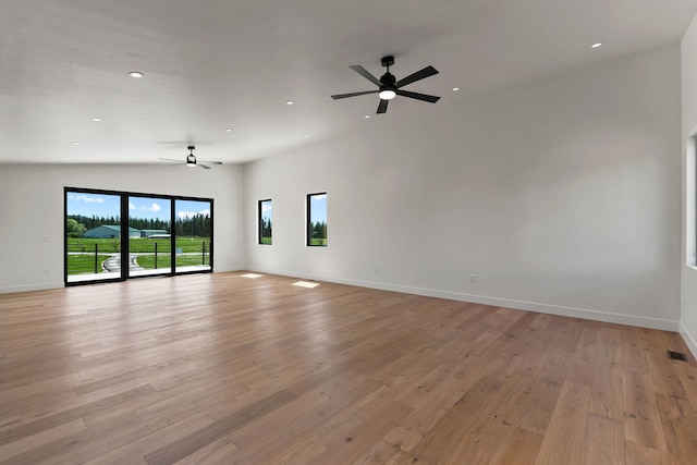 165 River Ranch Rd, Whitefish, MT 59937 - spare room featuring a ceiling fan, recessed lighting, light wood-type flooring, and baseboards