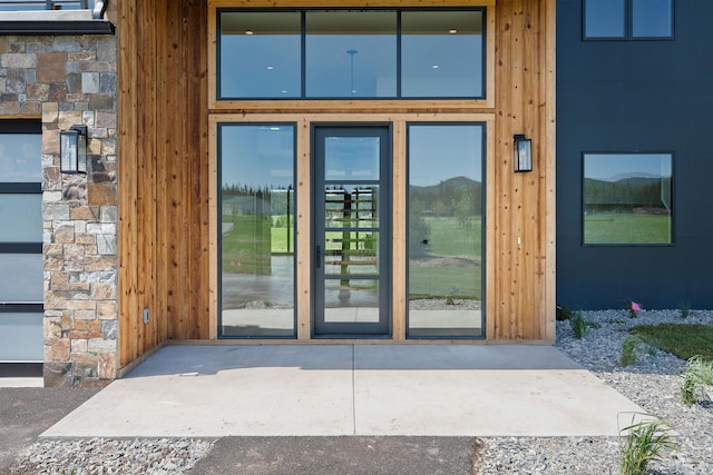 165 River Ranch Rd, Whitefish, MT 59937 - entrance to property featuring stone siding