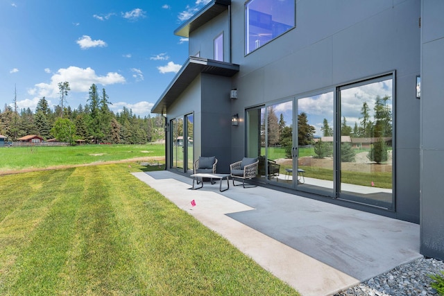 165 River Ranch Rd, Whitefish, MT 59937 - view of green lawn featuring a patio area