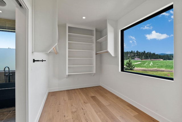 165 River Ranch Rd, Whitefish, MT 59937 - spacious closet featuring wood finished floors