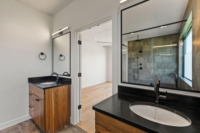 165 River Ranch Rd, Whitefish, MT 59937 - full bathroom with vanity, a stall shower, and baseboards
