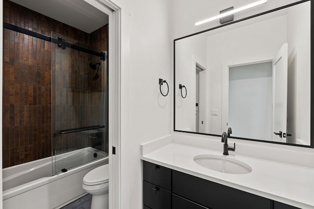 165 River Ranch Rd, Whitefish, MT 59937 - full bathroom with toilet, vanity, and combined bath / shower with glass door