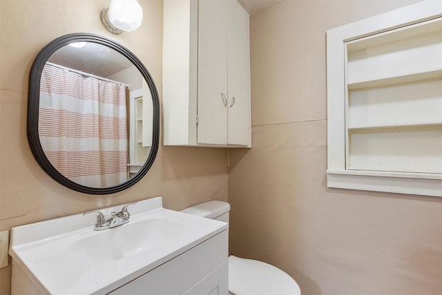 606 S Avenue W, Missoula, MT 59801 - bathroom featuring toilet, vanity, and a shower with curtain
