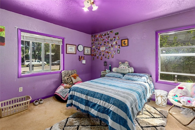 1319 3rd St, Whitefish, MT 59937 - carpeted bedroom with a textured wall