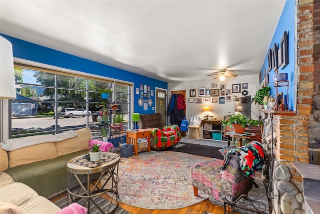 1319 3rd St, Whitefish, MT 59937 - living area featuring healthy amount of natural light, wood finished floors, and ceiling fan