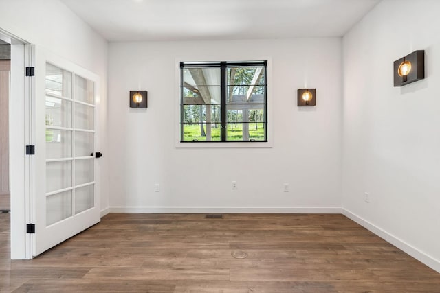 148 Blacktail Loop, Lakeside, MT 59922 - unfurnished room with wood finished floors and baseboards
