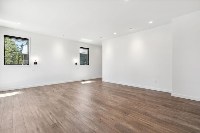 148 Blacktail Loop, Lakeside, MT 59922 - empty room featuring wood-type flooring, recessed lighting, and baseboards