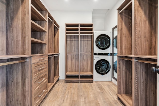 148 Blacktail Loop, Lakeside, MT 59922 - laundry room with stacked washer / drying machine and light wood-style floors