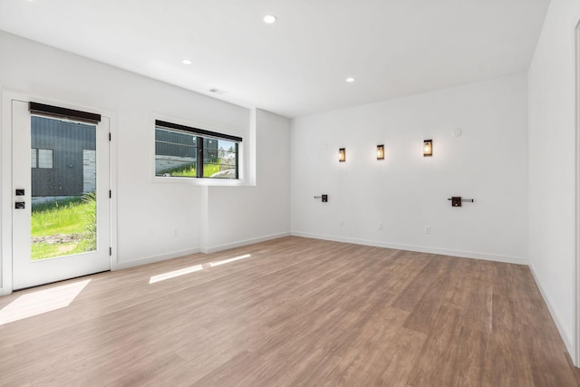 148 Blacktail Loop, Lakeside, MT 59922 - unfurnished room with light wood-style floors, baseboards, and recessed lighting