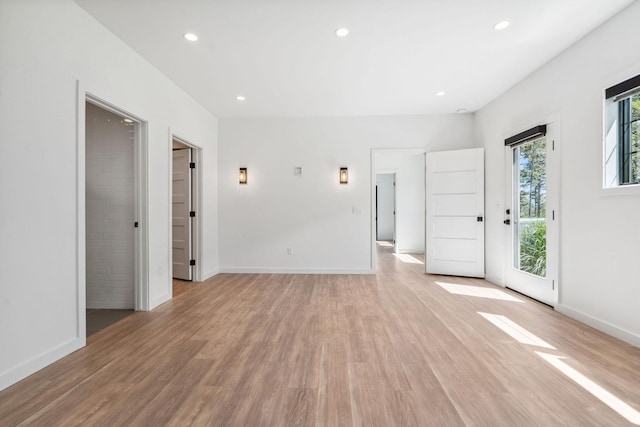 148 Blacktail Loop, Lakeside, MT 59922 - unfurnished room with light wood-style flooring, recessed lighting, and baseboards
