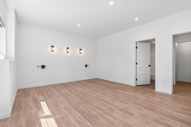 148 Blacktail Loop, Lakeside, MT 59922 - laundry room featuring light wood-type flooring, recessed lighting, and baseboards