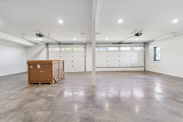 148 Blacktail Loop, Lakeside, MT 59922 - garage featuring a garage door opener, recessed lighting, and baseboards