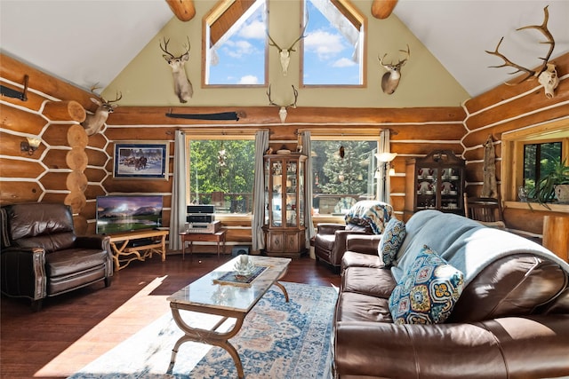 2700 Lyon Creek Rd, Missoula, MT 59804 - living area featuring log walls, high vaulted ceiling, and wood finished floors