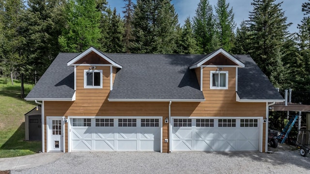 115 Wagon Wheel Rd, Whitefish, MT 59937 - garage with asphalt driveway