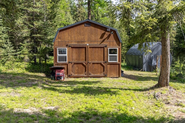 115 Wagon Wheel Rd, Whitefish, MT 59937 - view of shed featuring a forest view