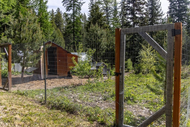 115 Wagon Wheel Rd, Whitefish, MT 59937 - view of yard with exterior structure and an outbuilding