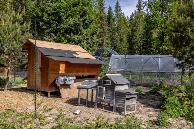 115 Wagon Wheel Rd, Whitefish, MT 59937 - view of yard with exterior structure and an outbuilding