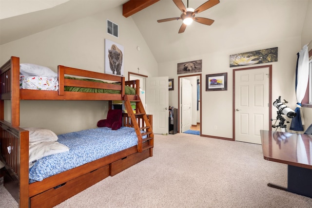 115 Wagon Wheel Rd, Whitefish, MT 59937 - carpeted bedroom with beam ceiling, high vaulted ceiling, and ceiling fan
