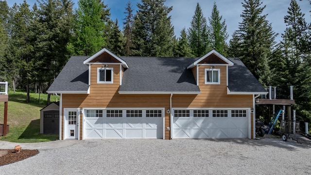 115 Wagon Wheel Rd, Whitefish, MT 59937 - garage featuring gravel driveway