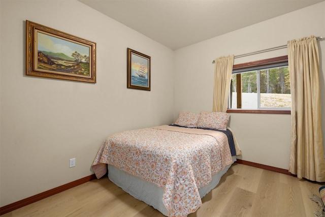 115 Wagon Wheel Rd, Whitefish, MT 59937 - bedroom with wood finished floors and baseboards