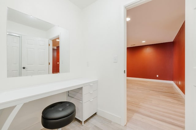 7567 Kingpost Loop, Helena, MT 59602 - bathroom featuring wood finished floors, baseboards, recessed lighting, and vanity