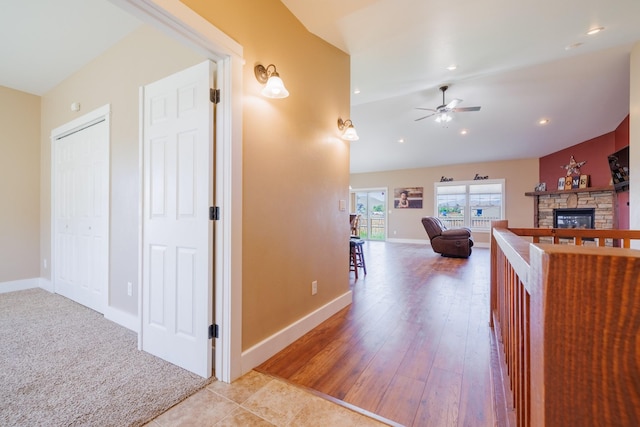 7567 Kingpost Loop, Helena, MT 59602 - hall featuring baseboards, lofted ceiling, wood finished floors, and recessed lighting