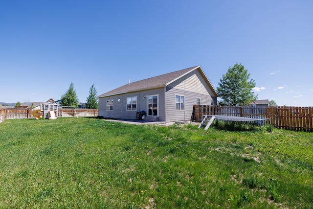 7567 Kingpost Loop, Helena, MT 59602 - back of house with a playground