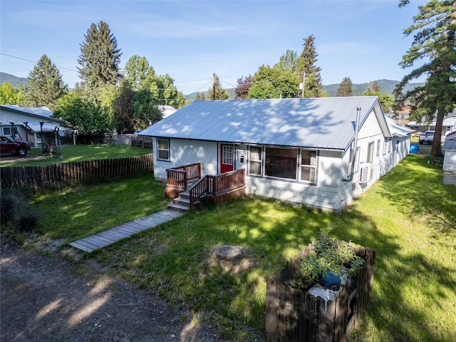 411 Colorado Ave, Libby, MT 59923 - view of front of home featuring metal roof and a mountain view