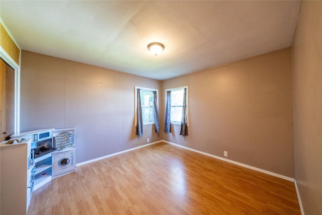 411 Colorado Ave, Libby, MT 59923 - empty room with light wood-type flooring and baseboards