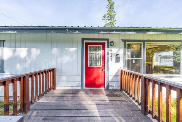 411 Colorado Ave, Libby, MT 59923 - doorway to property with a metal roof and a porch