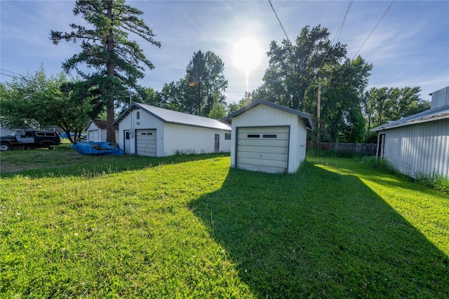 411 Colorado Ave, Libby, MT 59923 - view of yard with a detached garage and an outbuilding