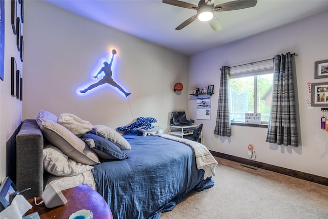 224 Forest Edge Trl, Kalispell, MT 59901 - carpeted bedroom featuring baseboards and ceiling fan