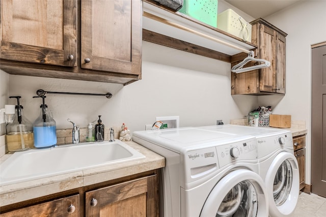 224 Forest Edge Trl, Kalispell, MT 59901 - washroom featuring cabinet space and washing machine and clothes dryer